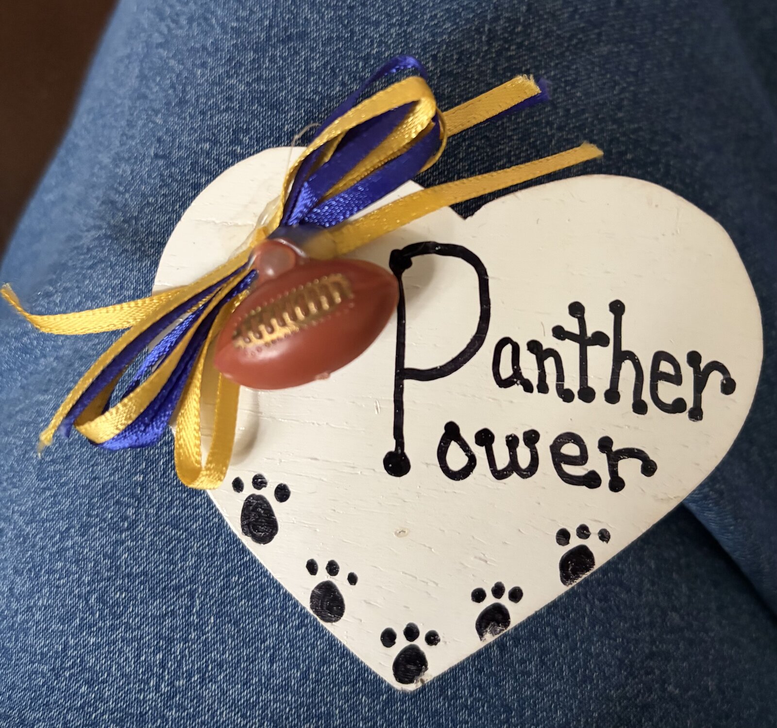 A handmade Panther Power keepsake in blue and gold